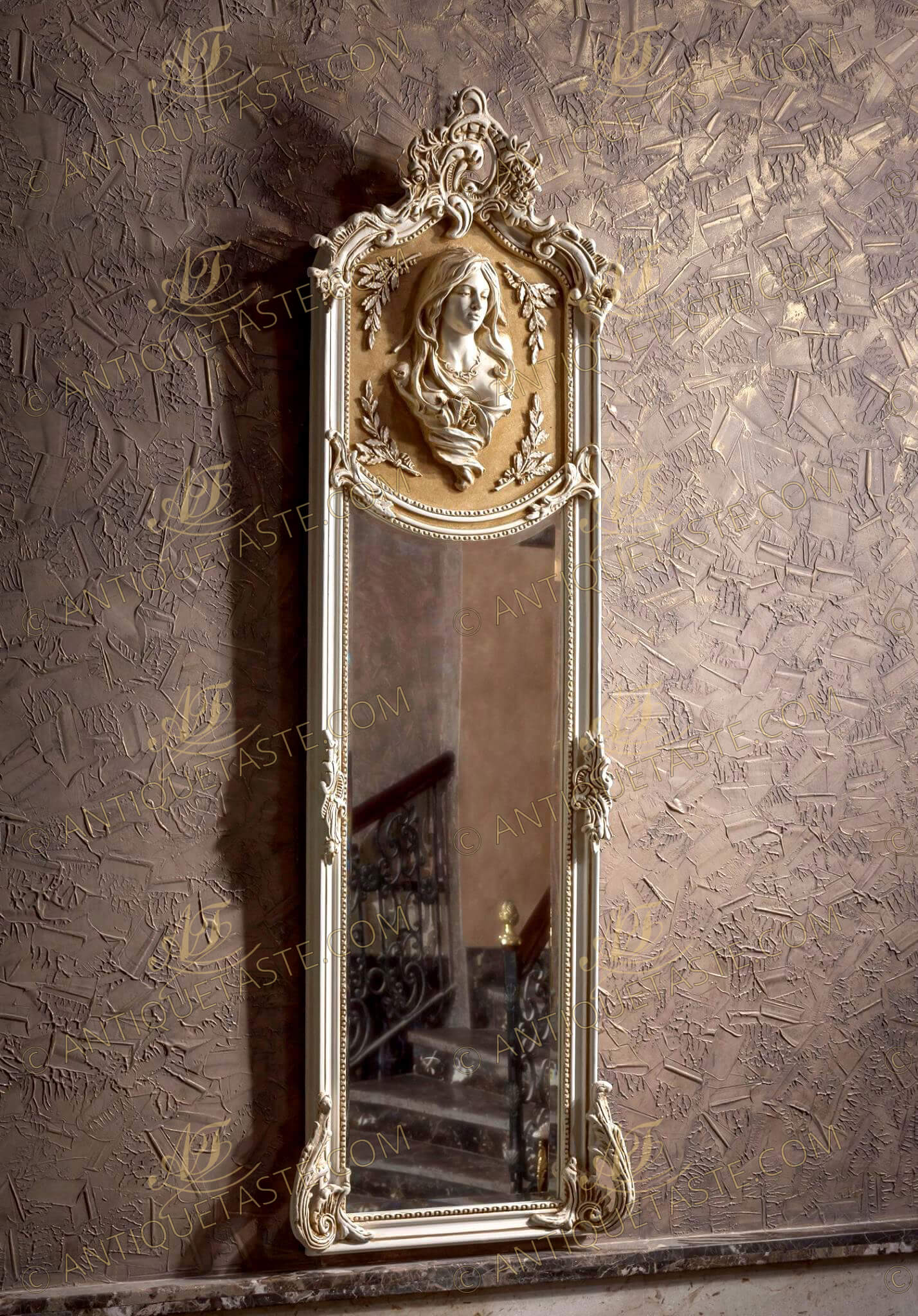 Sumptuous and Sensational large Louis XV Rococo style Pier Grand Pillar Mirror, hand carved with Rococo and Rocaille elements, painted in blanc de plomb finish and patinated, The mirror is available as well in full gilding with French gold foils 18th carat with patina and other style of ornate carvings applied on the top panel, center and bottom as displayed, The top is crested with rocaille scrolled acanthus blossoming motifs surmounting a main figure of delicate gesso female figure hand carved in extreme beauty, surrounded with olive branches, with a background finished in an elegant beige color, surrounded with pearl border, The large beveled mirror plate inset a concave moulded frame ornate with rococo moldings and internal pearls border, terminating with C scrolled pierced acanthus leaves on shell on each corner.
